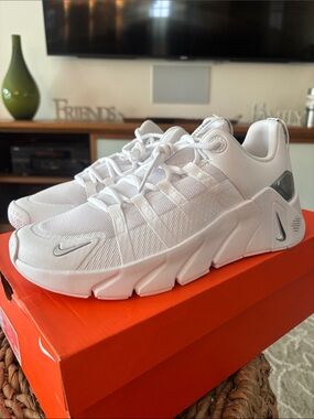 Nike White Low-Top Athletic Sneakers with Silver Accents